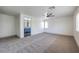 Large bedroom featuring neutral carpet and an ensuite bath with a view at 825 Cornerstone Pl, North Las Vegas, NV 89031