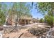 Large backyard featuring a covered patio and a built-in grill, perfect for outdoor entertaining at 825 Cornerstone Pl, North Las Vegas, NV 89031