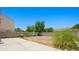 Backyard features a patio, cinder block walls, desert landscaping and a grill at 845 Bladensburg St, Las Vegas, NV 89110