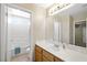 Bathroom features a sink, vanity and a walk-in shower at 845 Bladensburg St, Las Vegas, NV 89110