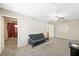Spacious bedroom featuring neutral walls, carpet, and ceiling fan at 845 Bladensburg St, Las Vegas, NV 89110