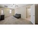 Bonus room featuring neutral walls, plush carpeting, a ceiling fan and an ensuite bathroom at 845 Bladensburg St, Las Vegas, NV 89110