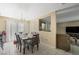 Dining room with seating for six and sliding glass doors at 845 Bladensburg St, Las Vegas, NV 89110