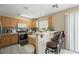Functional kitchen with stainless steel appliances and bar seating at 845 Bladensburg St, Las Vegas, NV 89110
