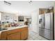 Kitchen with stainless appliances and access to other living spaces at 845 Bladensburg St, Las Vegas, NV 89110