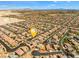 Wide aerial perspective of a residential area, indicating the location of a home within the community at 8925 Kenzie Cove St, Las Vegas, NV 89131