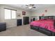Bedroom featuring a ceiling fan, closet, and carpet for comfort at 8925 Kenzie Cove St, Las Vegas, NV 89131