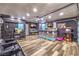 Finished basement featuring a bar, seating, and a sound recording booth at 8932 Beach Front Dr, Las Vegas, NV 89117