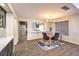 Open-concept dining room featuring a view into the modern kitchen at 8932 Beach Front Dr, Las Vegas, NV 89117