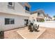 Private backyard patio area featuring a table with chairs, perfect for outdoor relaxation and entertaining with low maintenance landscaping at 9362 Straw Hays St # 103, Las Vegas, NV 89178