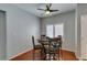 Charming dining area features a modern ceiling fan and bright natural light at 9362 Straw Hays St # 103, Las Vegas, NV 89178