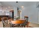 Dining area near the kitchen features stainless steel appliances and granite countertops at 9362 Straw Hays St # 103, Las Vegas, NV 89178