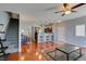 Spacious open concept living area leading to the kitchen and a staircase to upper level at 9362 Straw Hays St # 103, Las Vegas, NV 89178