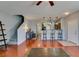 Open-concept living area leading to the kitchen and a staircase to upper level at 9362 Straw Hays St # 103, Las Vegas, NV 89178