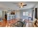 Bright living room with wood floors and a breakfast bar, great for entertaining at 9362 Straw Hays St # 103, Las Vegas, NV 89178