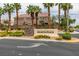 Welcome to Arlington Ranch with mature landscaping and a decorative stone entrance sign, offering a warm invitation at 9362 Straw Hays St # 103, Las Vegas, NV 89178