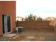 Small backyard area with a block wall and gravel ground at 9402 Crimson Sky St, Las Vegas, NV 89178
