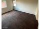 Corner bedroom featuring light walls, carpeted flooring, and two bright windows at 9402 Crimson Sky St, Las Vegas, NV 89178
