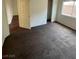 Cozy bedroom with an open closet and a large window for natural light at 9402 Crimson Sky St, Las Vegas, NV 89178