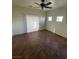 Bright bedroom featuring a sliding glass door and natural light at 9402 Crimson Sky St, Las Vegas, NV 89178