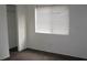Bedroom with a closet, window with blinds, and light-colored walls at 9402 Crimson Sky St, Las Vegas, NV 89178