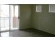 Well-lit bedroom features a sliding glass door at 9402 Crimson Sky St, Las Vegas, NV 89178