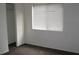 Bedroom with a closet, window with blinds, and light-colored walls at 9402 Crimson Sky St, Las Vegas, NV 89178