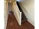 Staircase leading to the second floor with hard surface flooring on the main level at 9402 Crimson Sky St, Las Vegas, NV 89178