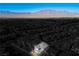 Focused aerial view highlighting a single property in a residential neighborhood at 9476 Lunar Phase St, Las Vegas, NV 89143