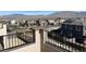 View from the balcony highlighting the neighborhood, landscaping, and surrounding mountain views at 9476 Lunar Phase St, Las Vegas, NV 89143