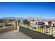 Expansive balcony view overlooking a neighborhood with mountain views in the distance at 9476 Lunar Phase St, Las Vegas, NV 89143