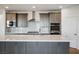 Spacious kitchen island with modern cabinets, countertops, and stainless appliances at 9476 Lunar Phase St, Las Vegas, NV 89143