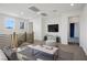 Upstairs loft area featuring sleek railings, modern furnishings, and plenty of natural light at 9476 Lunar Phase St, Las Vegas, NV 89143