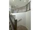 Carpeted staircase with modern railing design offers access to upper floors at 9476 Lunar Phase St, Las Vegas, NV 89143