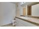 Granite counters and white cabinetry highlight this well-lit full bathroom at 950 Seven Hills Dr # 524, Henderson, NV 89052