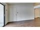 A naturally lit living room featuring hardwood floors and an entrance to a patio at 950 Seven Hills Dr # 524, Henderson, NV 89052