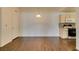 Well-lit living space adjacent to a kitchen with modern appliances and convenient storage at 950 Seven Hills Dr # 524, Henderson, NV 89052