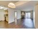 Open-concept living space featuring a kitchen and comfortable living area with fireplace at 950 Seven Hills Dr # 524, Henderson, NV 89052