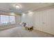 Bonus room features recessed lighting, a carpeted floor, and window with view to the backyard at 9835 Fox Estate St, Las Vegas, NV 89141