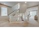 Cozy loft with staircase, and views of the front entry and the main living area at 9835 Fox Estate St, Las Vegas, NV 89141