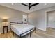 Bedroom boasts natural light, modern ceiling fan, and wood flooring at 1017 E Oakey Blvd, Las Vegas, NV 89104