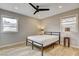 Bedroom boasts natural light, modern ceiling fan, and wood flooring at 1017 E Oakey Blvd, Las Vegas, NV 89104