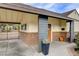 Charming single-story home featuring a gated carport and beautifully landscaped front entrance at 1017 E Oakey Blvd, Las Vegas, NV 89104