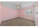 Bedroom featuring carpet, a modern ceiling fan, and a window with blinds at 10373 Northern Hills Ave, Las Vegas, NV 89166