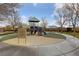 Community playground featuring play equipment and shaded seating areas at 10373 Northern Hills Ave, Las Vegas, NV 89166