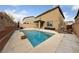 Enjoy the backyard swimming pool with a lounge area, perfect for outdoor entertaining at 10373 Northern Hills Ave, Las Vegas, NV 89166