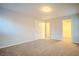 Spacious carpeted bedroom with access to closet and en suite bathroom at 1136 Paradise Garden Dr, Henderson, NV 89002