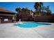 Community pool featuring crystal-clear water and a spacious deck area for residents at 1136 Paradise Garden Dr, Henderson, NV 89002