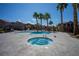 Community pool area with a hot tub and palm trees, creating a resort-like atmosphere at 1136 Paradise Garden Dr, Henderson, NV 89002