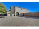 Side yard featuring desert landscaping, offering a low-maintenance and water-wise design at 1317 Hopespring Loop Ave, North Las Vegas, NV 89084
